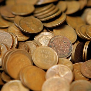 GLENVIEW, IL - JULY 06: Pennies are displayed at Glenview Coin & Collectibles July 6, 2006 in Glenview, Illinois. Reportedly due to manufacturing costs, the US Mint may be contemplating discontinuing the penny. (Photo by Tim Boyle/Getty Images)