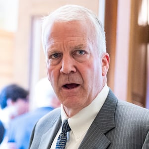 Sen. Dan Sullivan, R-Alaska,  speaks to reporters as he arrives for the Senate Republicans' lunch meeting in the U.S. Capitol on Tuesday, June 16, 2026.