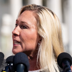 WASHINGTON - MAY 1: Rep. Marjorie Taylor Greene, R-Ga., holds her "Make America Great Again" hat during the news conference outside the U.S. Capitol on Wednesday, May 1, 2024, announcing she will move forward next week on the motion to vacate Speaker Mike Johnson. (Bill Clark/CQ-Roll Call, Inc via Getty Images)