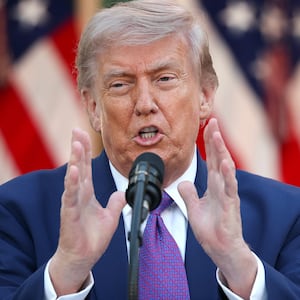 President Donald Trump delivers remarks at a 'Rose Garden Club' dinner for National Police Week in the Rose Garden at the White House on May 11, 2026 in Washington, DC. Trump hosted leaders of various law enforcement organizations in honor of officers fallen in the line of duty.