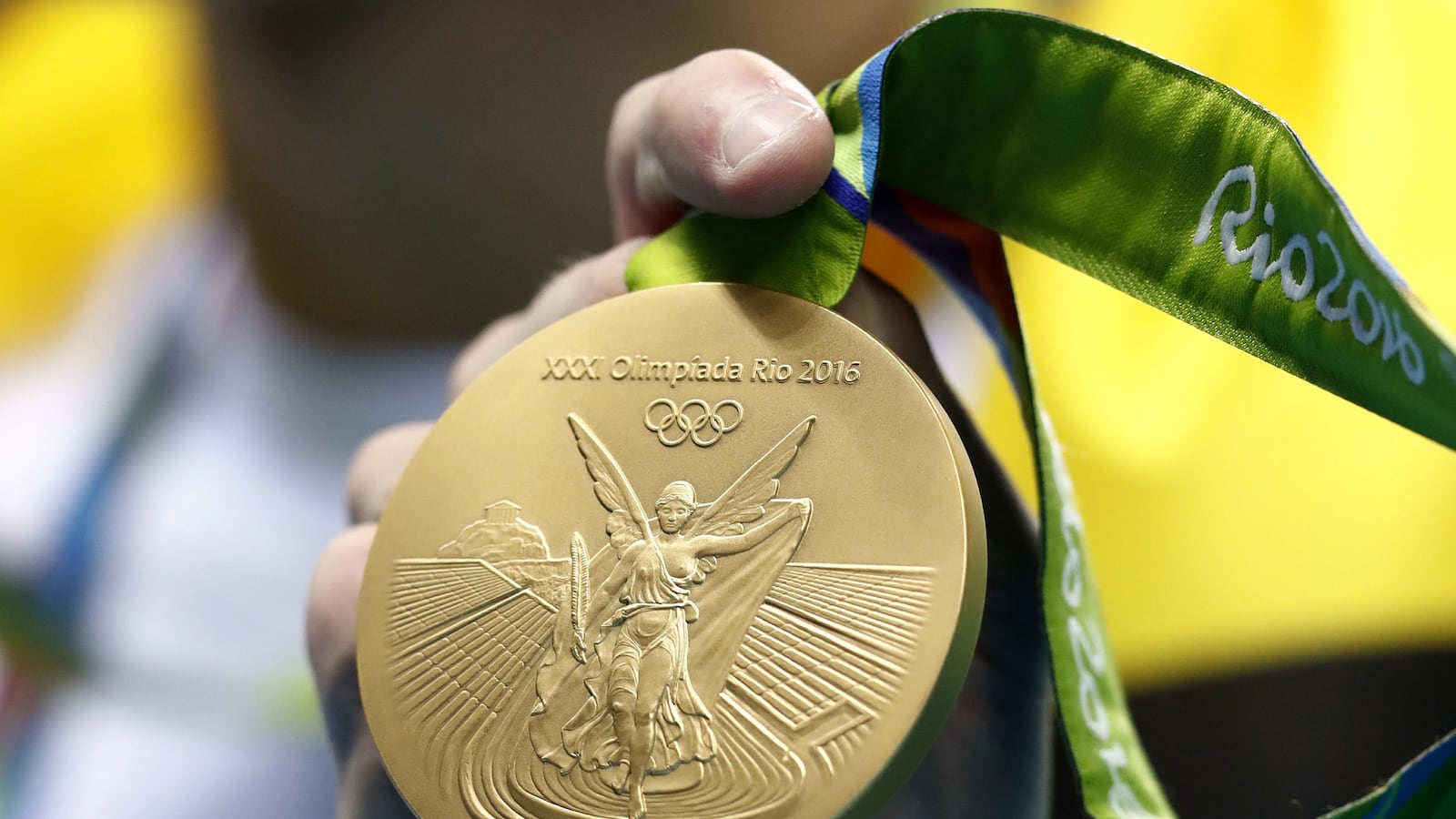 articles/2016/08/12/whose-gold-medal-is-worth-the-most/160811-glasser-olympic-medal-tease_mvemzf