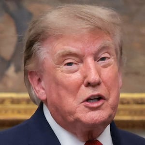Trump speaks next to CEO of Intercontinental Exchange Jeffrey Sprecher in the Roosevelt Room during a cryptocurrency-related event.
