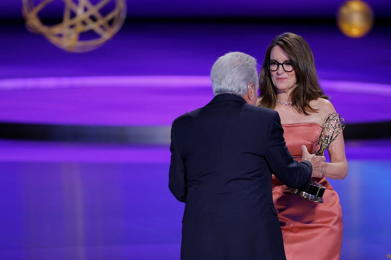 Lorne Michaels accepts the award for Outstanding Variety Special (Live) award for "SNL50: The Anniversary Special" from presenter Tina Fey