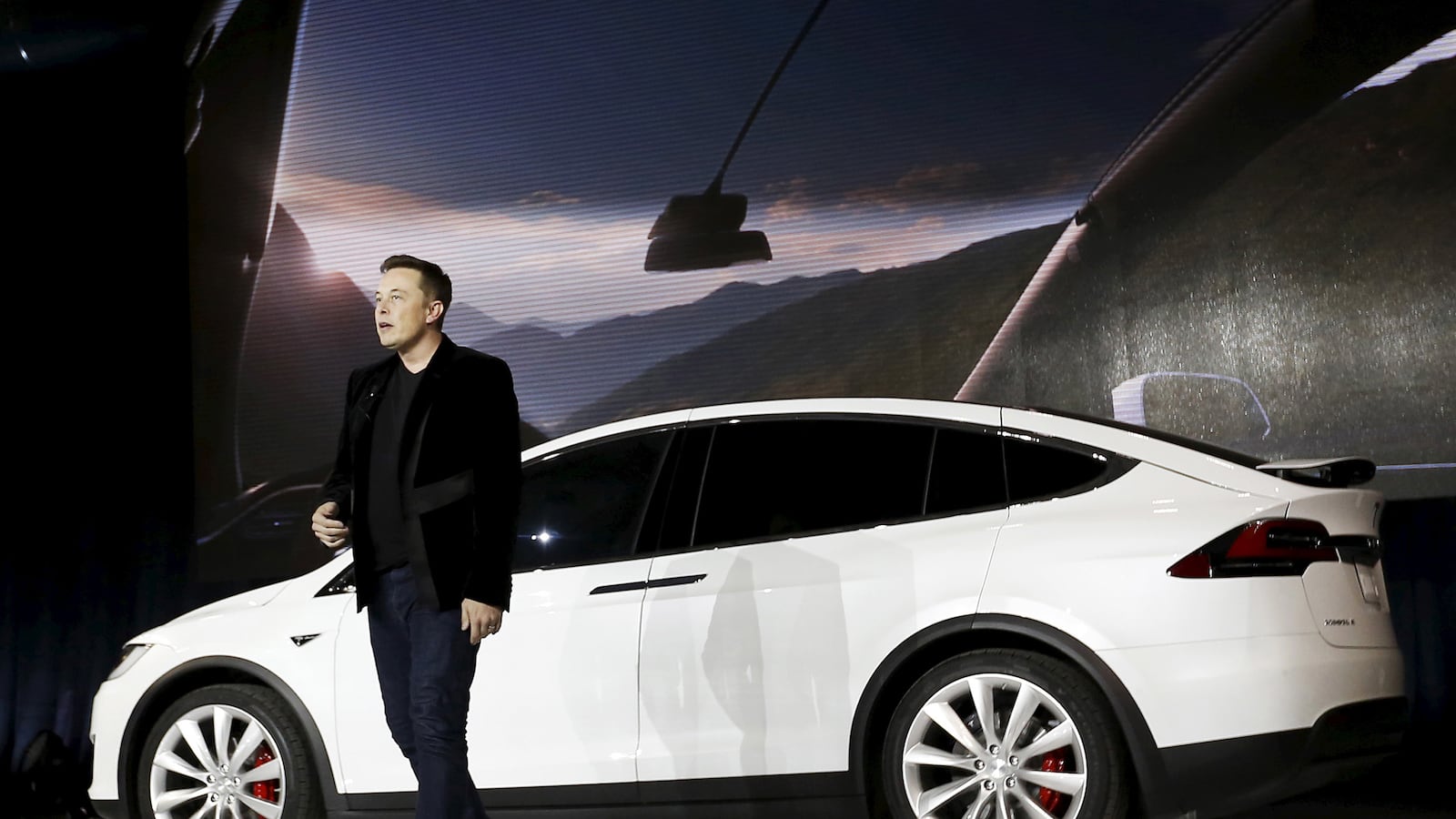 articles/2015/09/30/tesla-builds-a-car-to-survive-the-coming-apocalypse/150930-strochlic-tesla-tease_wv6jzu