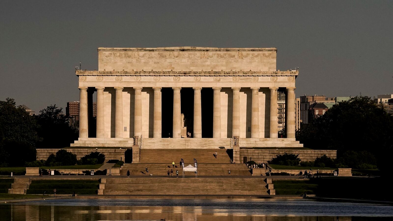 A view shows a reflection of the Lincoln Memorial in the Lincoln Memorial Reflecting Pool in early morning ahead of Memorial Day weekend in Washington, DC
