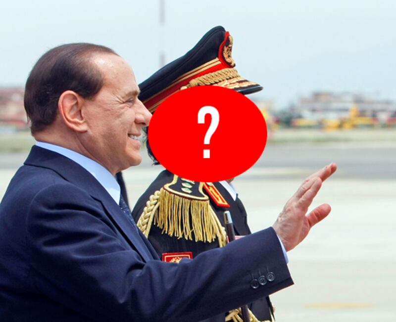 galleries/2011/03/07/gaddafi-or-hotel-doorman/gaddafi-doorman-8-question_qvmvsq