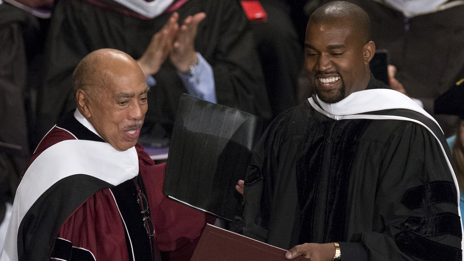 articles/2015/05/12/dr-kanye-west-mocks-george-w-bush-bush-center-giggles/150512-swin-kanye-tease_noljmm