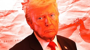 Donald Trump in front of a map of the Strait of Hormuz.