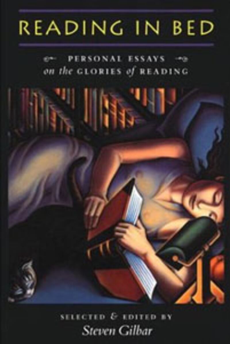 articles/2012/07/19/8-great-books-about-books-phantoms-on-the-bookshelves-more/books-about-books-reading-in-bed_inej87