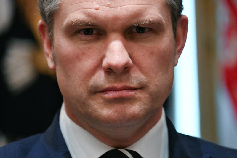 Defense Secretary Pete Hegseth looks on during a cabinet meeting in the Cabinet Room of the White House on March 26, 2026.