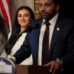 WASHINGTON, DC - FEBRUARY 21: New Federal Bureau of Investigation Director Kash Patel speaks as his girlfriend Alexis Wilkins (C) looks on during his swearing in ceremon in the Indian Treaty Room in the Eisenhower Executive Office Building on February 21, 2025 in Washington, DC. Patel was confirmed by the Senate 51-49, with Sen. Susan Collins (R-ME) and Sen. Lisa Murkowski (R-AK) the only Republicans voting to oppose him. Patel has been a hard-line critic of the FBI, the nation’s most powerful law enforcement agency. (Photo by Chip Somodevilla/Getty Images)