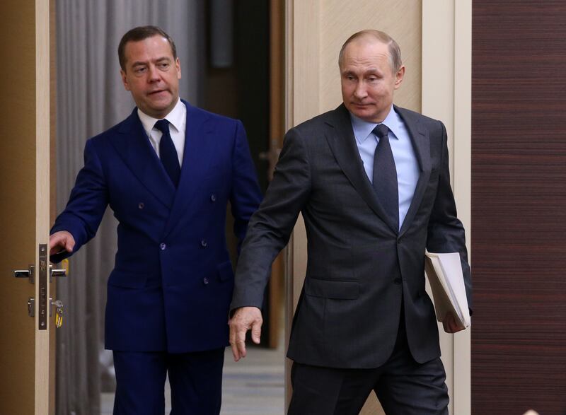 MOSCOW OBLAST, RUSSIA - APRIL 18: (RUSSIA OUT) Russian President Vladimir Putin (R) and Prime Minister Dmitry Medvedev (L) enter the hall during their weekly meeting with ministers of Russian Governmnet at Novo-Ogaryovo State residence on April,18, 2018 outside of Moscow, Russia. Russian President and Austrian Chancellor Sebastian Kurz spoke by phone on Wednesday to discuss the situation in Syria, according to the Kremlin Press Service. (Photo by Mikhail Svetlov/Getty Images)
