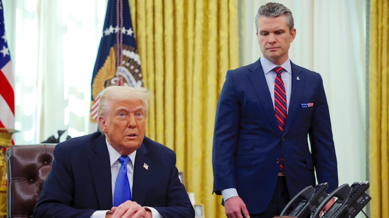 U.S. President Donald Trump delivers remarks with Defense Secretary Pete Hegseth in the Oval Office at the White House, in Washington, D.C., U.S., March 21, 2025.