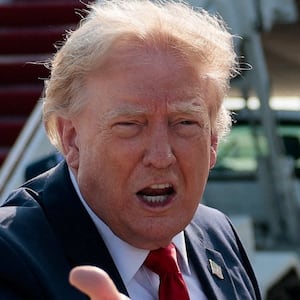 U.S. President Donald Trump gestures as he speaks with reporters before boarding the new Air Force One, a plane gifted by the Qatari government, at Joint Base Andrews, Maryland, U.S., July 1, 2026. REUTERS/Evan Vucci