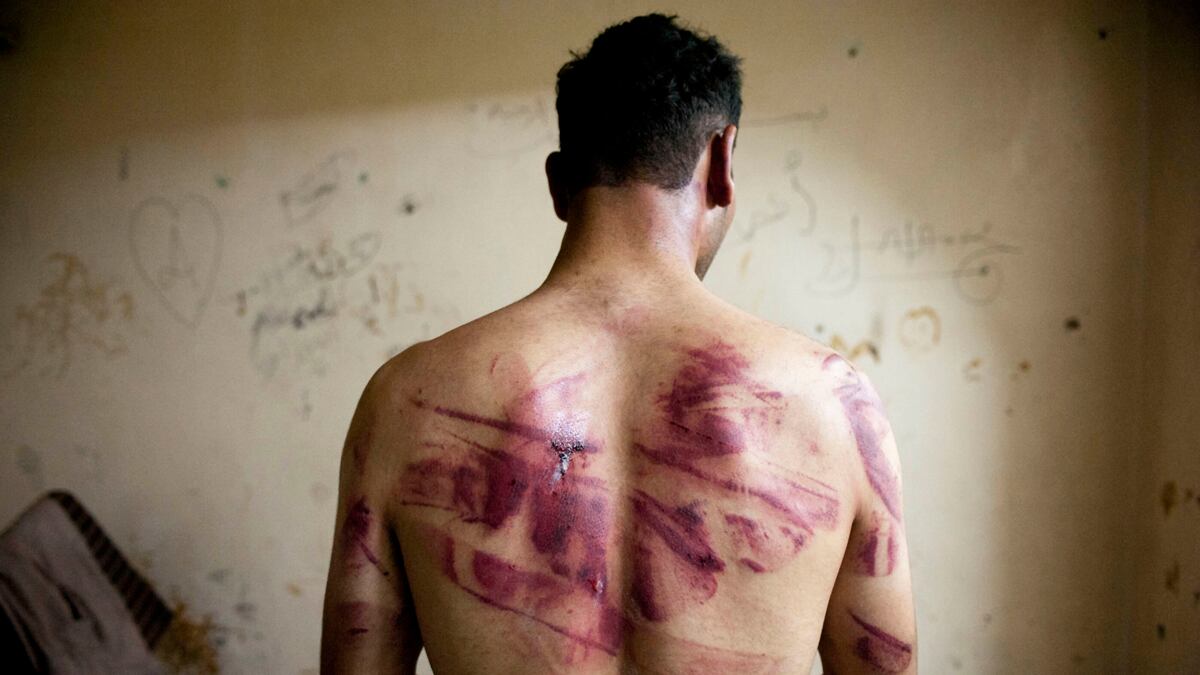 articles/2012/10/14/assad-s-house-of-torture/day-assad-torture-tease-embed_ecrskt