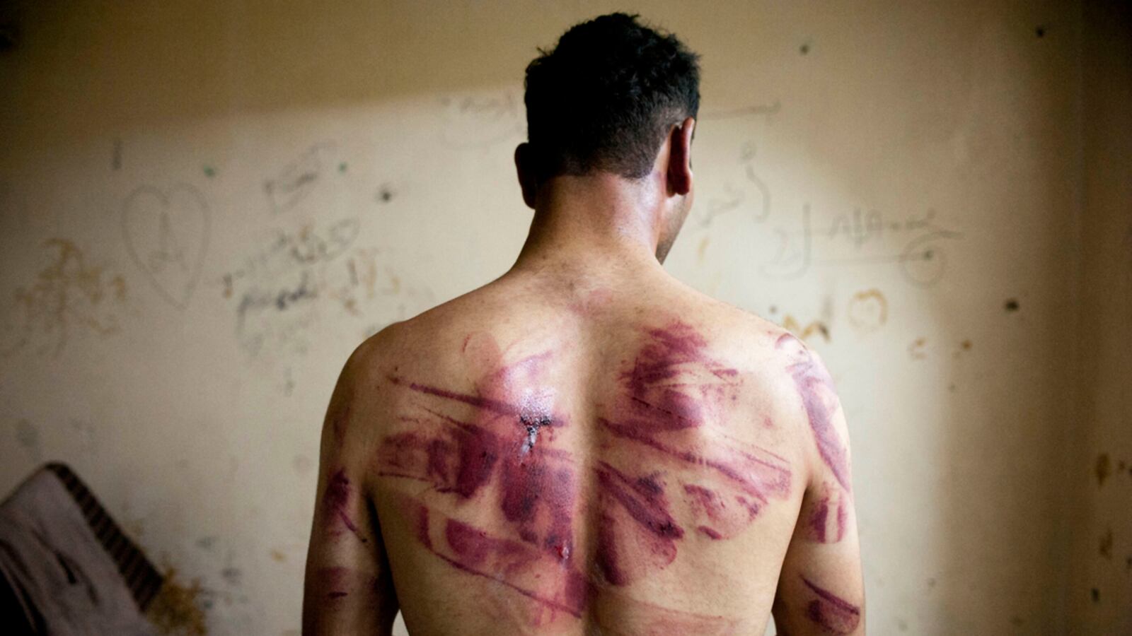articles/2012/10/14/assad-s-house-of-torture/day-assad-torture-tease-embed_ecrskt