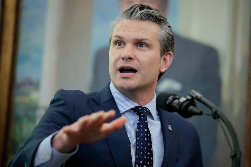 U.S. Defense Secretary Pete Hegseth speaks, following Markwayne Mullin's swearing-in as Department of Homeland Security (DHS) Secretary, at the White House in Washington, D.C., U.S., March 24, 2026.