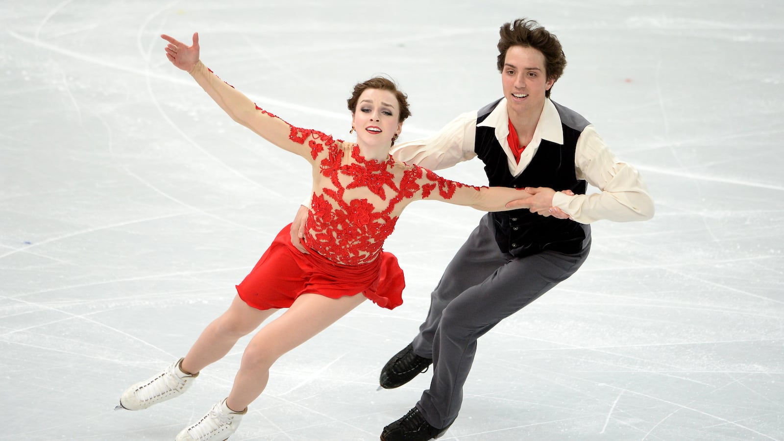 Canada’s Alexandra Paul and Canada's Mitchell Islam compete during the Sochi Winter Olympics. Paul was killed in a devastating crash involving seven vehicles after a semi-truck rammed into her car.