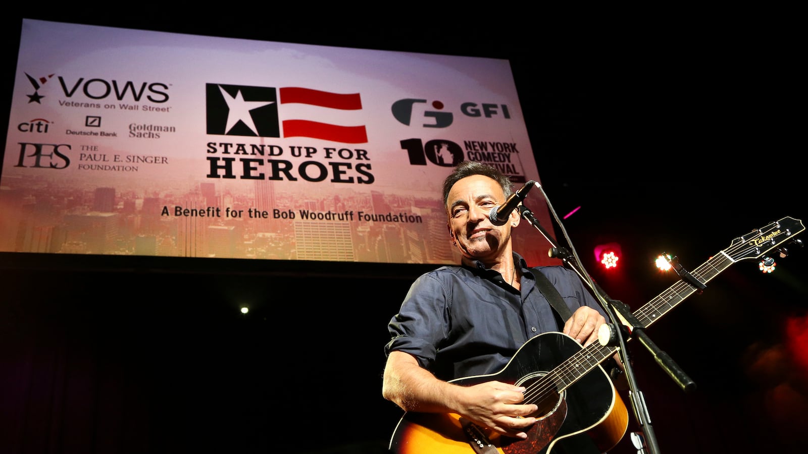 articles/2014/11/06/bruce-springsteen-jon-stewart-and-louis-c-k-stand-up-for-soldiers/141105-suskind-heroes-tease_e3tc7u