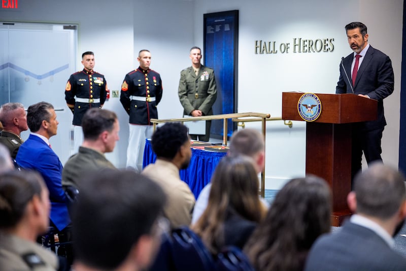 ARLINGTON, VIRGINIA - AUGUST 26: Sean Parnell, Chairman of the Afghanistan Withdrawal Special Review Panel and the Chief Pentagon Spokesman (R) speaks during an event to honor Marines who were serving during the 2021 Abbey Gate bombing, at the Pentagon on August 26, 2026 in Arlington, Virginia. Three U.S. Marines from Golf Company have their valor awards formally upgraded to honor their heroism and lifesaving actions during the 2021 Abbey Gate bombing, at Hamid Karzai International Airport in Kabul. Also pictured is Secretary of War Pete Hegseth (2nd-L). (Photo by Andrew Harnik/Getty Images)