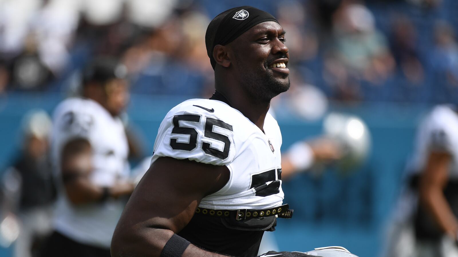 Las Vegas Raiders defensive end Chandler Jones (55) stretches before the game against the Tennessee Titans