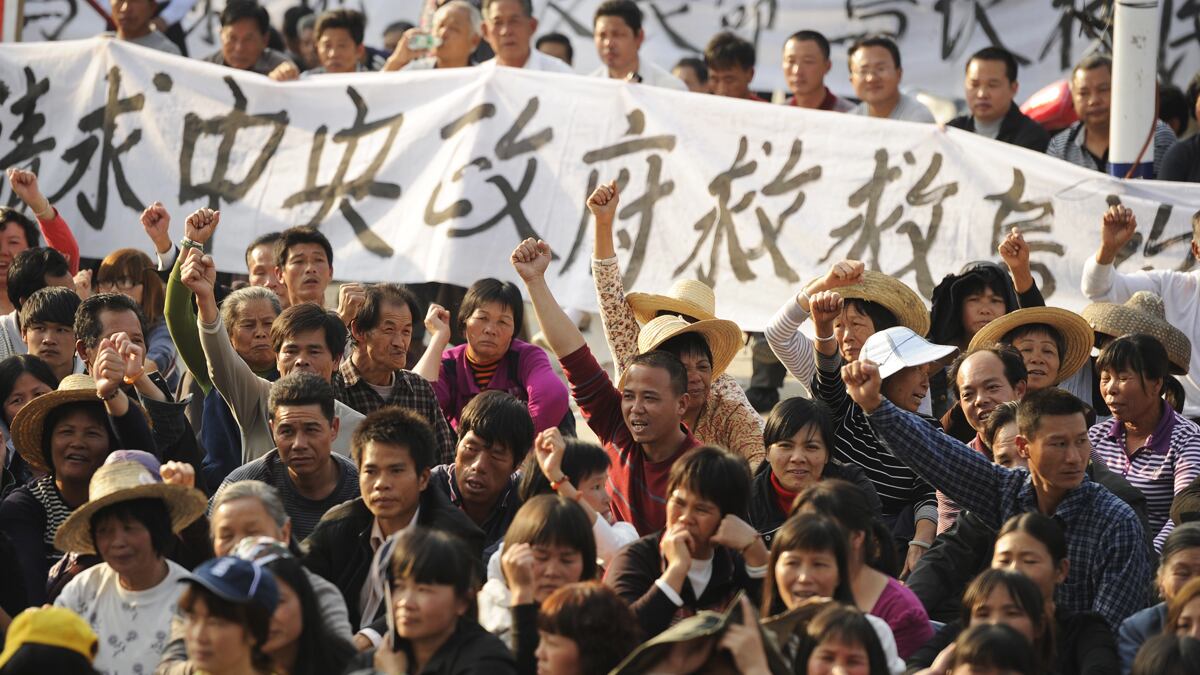 cheats/2011/12/15/china-threatens-to-strike-hard-against-revolt/china-wukan-land-deal-halted-protests-cs_oaoybv