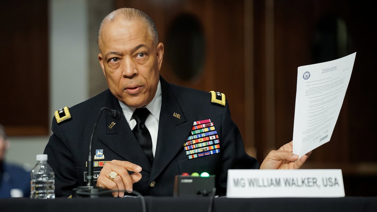 2021-03-03T164505Z_1311711212_RC2S3M9A5WSG_RTRMADP_3_USA-CONGRESS-SECURITY-CAPITOL_mxbw05