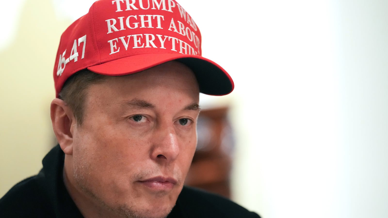 Elon Musk's connection to the Trump administration is damaging the Tesla brand, an analyst has warned.