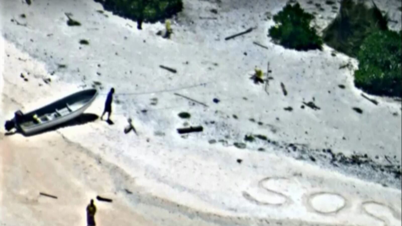 cheats/2016/08/27/mariners-stranded-on-deserted-island-saved-after-sos-in-sand/160827-navy-rescue-sos-cheat_unxnyz