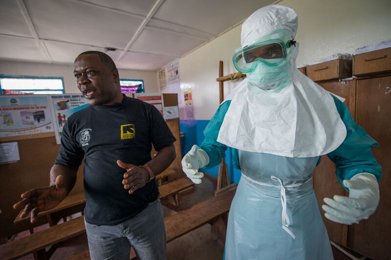 galleries/2014/11/12/liberia-s-ebola-corpse-squads-photos/141111-biro7-ebola3-tease_f23jqm