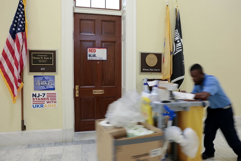 A worker passes the office door of U.S. Representative Tom Kean Jr. (R-NJ), who has not been seen in public in two months, at the Cannon House Office Building on Capitol Hill in Washington, D.C., U.S., May 14, 2026. REUTERS/Jonathan Ernst