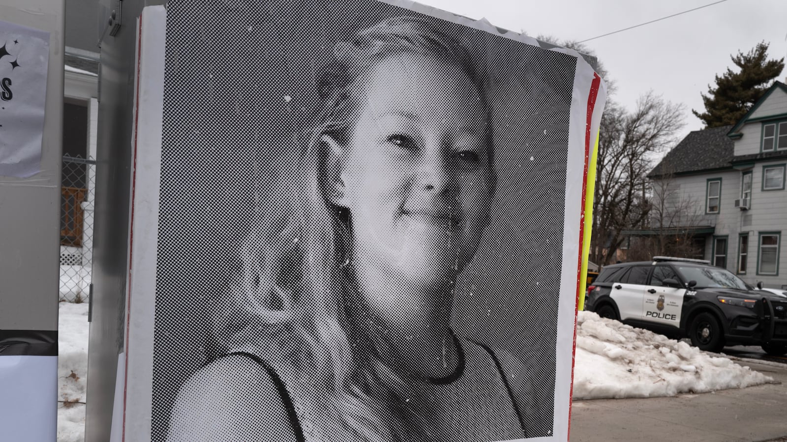 MINNEAPOLIS, MINNESOTA - JANUARY 16: A poster featuring Renee Good sits along the street near a memorial to Good on January 16, 2026 in Minneapolis, Minnesota. Protests have sparked up around the city after a federal agent fatally shot Good in her car during an incident in south Minneapolis on January 7. (Photo by Scott Olson/Getty Images)