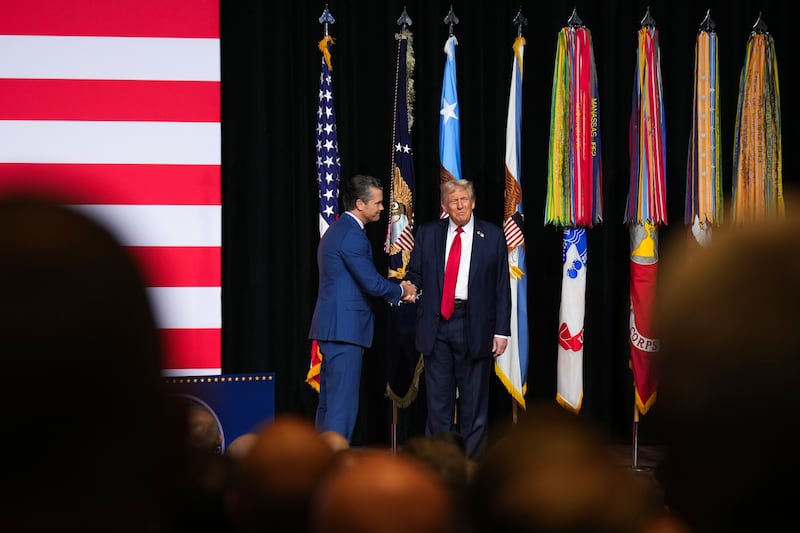 President Donald Trump greets Defense Secretary Pete Hegseth as he arrives to speak to senior military leaders at Marine Corps Base Quantico on September 30, 2025 in Quantico, Virginia.
