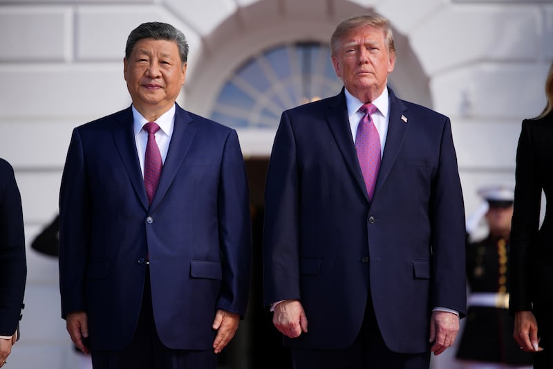 WASHINGTON, DC - SEPTEMBER 24: U.S. President Donald Trump (R) stands with President of China Xi Jinping during an arrival ceremony at the White House on September 24, 2026 in Washington, DC. President Trump is hosting President Xi for a three-day state visit to Washington, DC where the leaders are expected to discuss trade practices, artificial intelligence and furthering "strategic stability" between their countries. (Photo by Andrew Harnik/Getty Images)