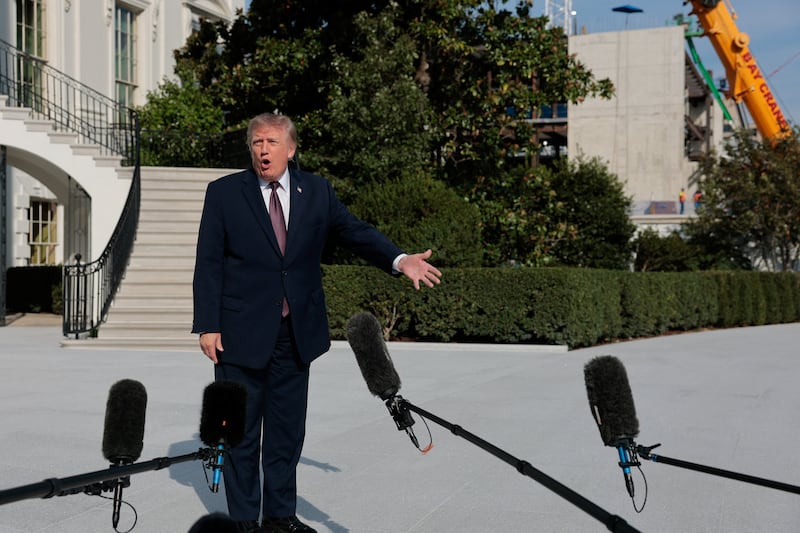 US President Donald Trump speaks with media before boarding Marine One as he departs for Mobile, Alabama, on the South Lawn of the White House in Washington, D.C., US, October 2, 2026. REUTERS/Kylie Cooper