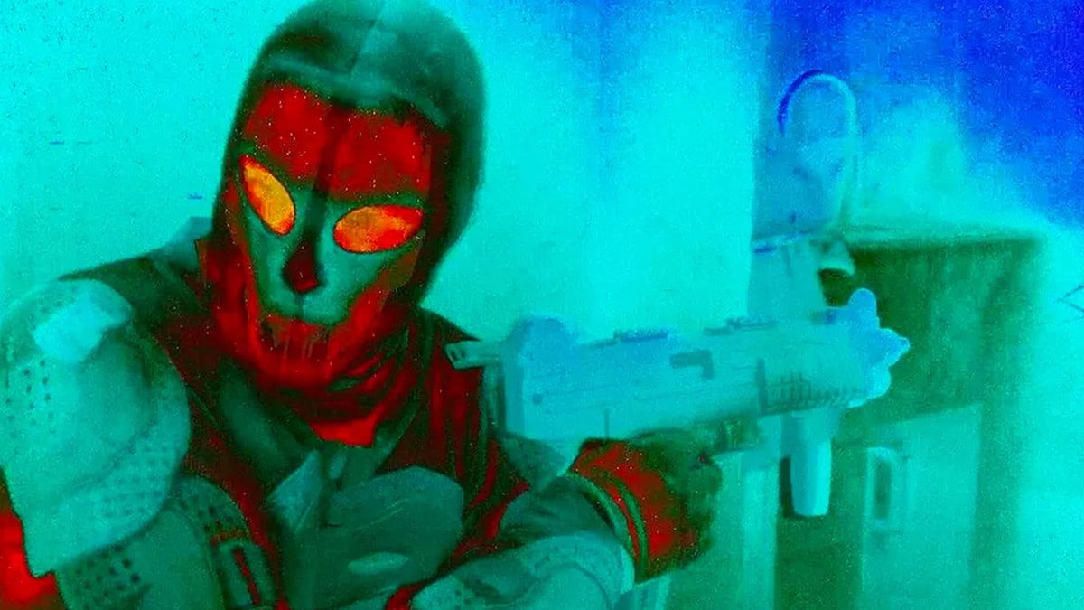 Jordi Mollà holds a gun in a still from ‘Aggro Dr1ft’