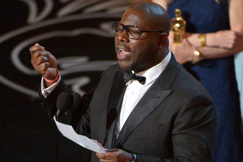 articles/2014/03/03/the-changing-color-of-the-oscars-12-years-a-slave-makes-history/20140302-mcqueen-oscars_w57ncs