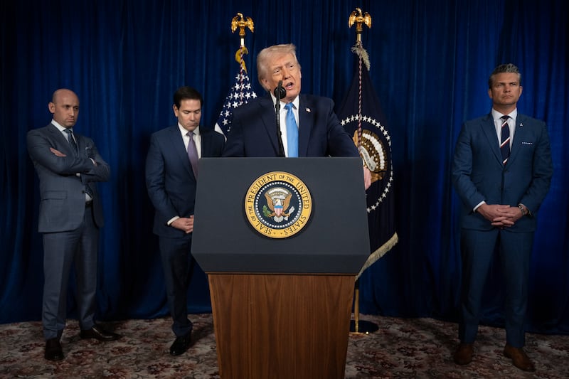 US President Donald Trump, alongside (L/R) Deputy Chief of Staff Stephen Miller, Secretary of State Marco Rubio, and US Secretary of Defense Pete Hegseth, speaks to the press following US military actions in Venezuela, at his Mar-a-Lago residence in Palm Beach, Florida, on January 3, 2026. President Trump said Saturday that US forces had captured Venezuelan leader Nicolas Maduro after launching a "large scale strike" on the South American country. (Photo by Jim WATSON / AFP via Getty Images)