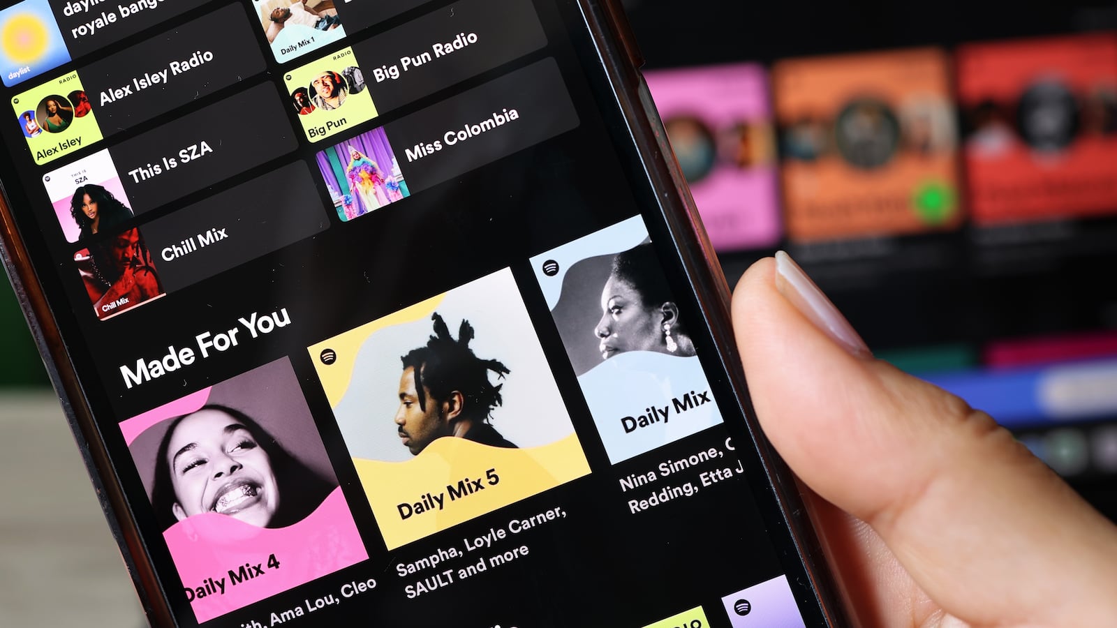 NEW YORK, NEW YORK - JUNE 04: In this photo illustration, the Spotify music app is seen on a phone on June 04, 2024 in New York City. Spotify made an announcement that it will be raising the price of its Spotify Premium Individual plan by $1, from $10.99 to $11.99 per month and the Premium Family plan by $3, from $16.99 to $19.99 per month. (Photo Illustration by Michael M. Santiago/Getty Images)