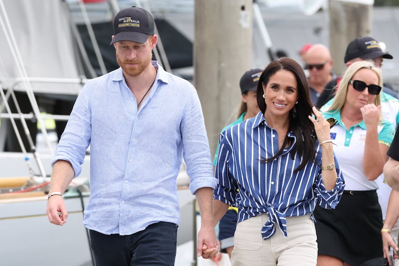 Britain's Prince Harry and Meghan, the Duke and Duchess of Sussex, arrive at Rushcutters Bay following a sail on Sydney Harbour with veterans from the Invictus Australia community in Sydney, Australia, on April 17, 2026.