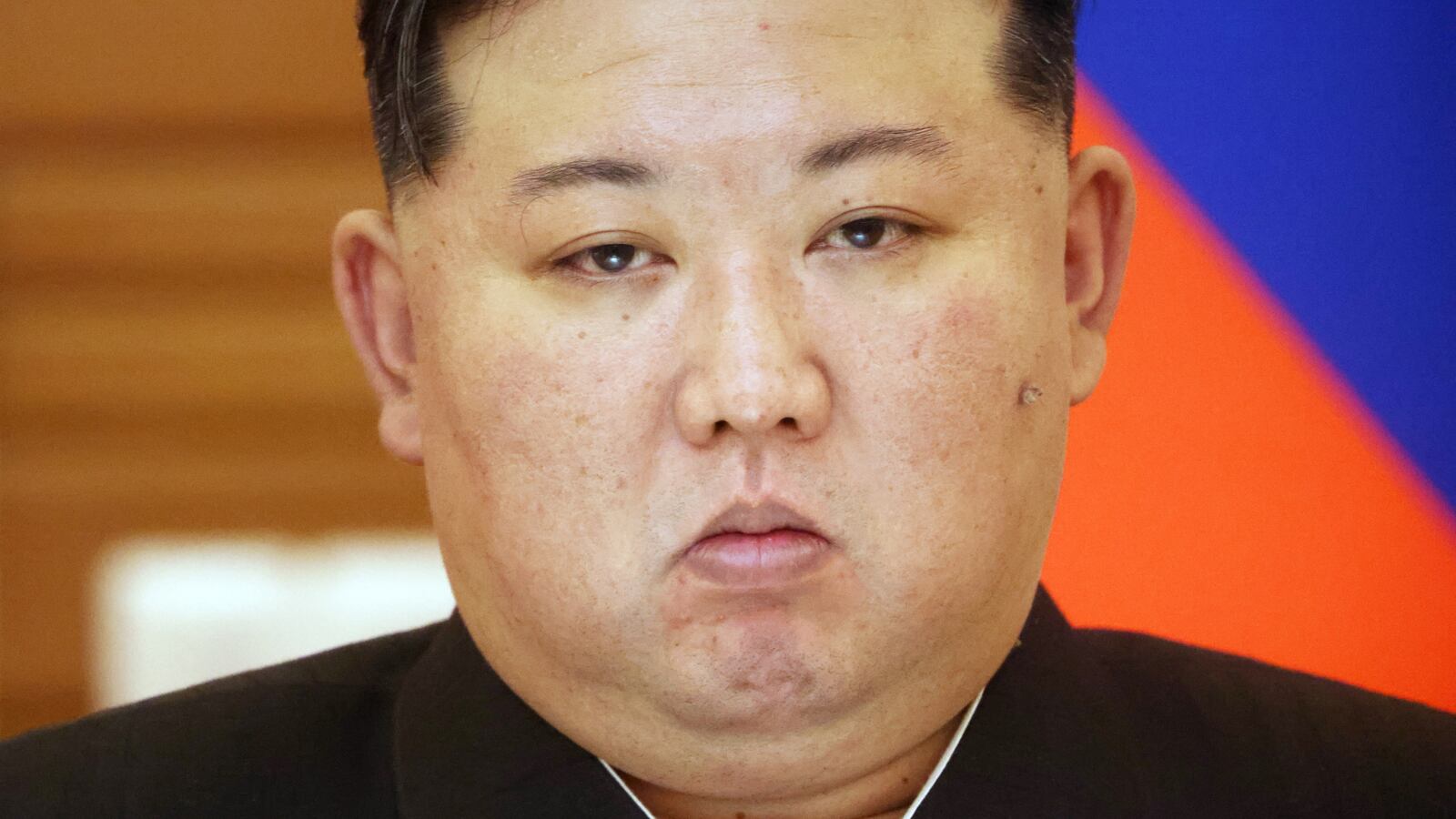 North Korean Supreme Leader Kim Jong Un grimases