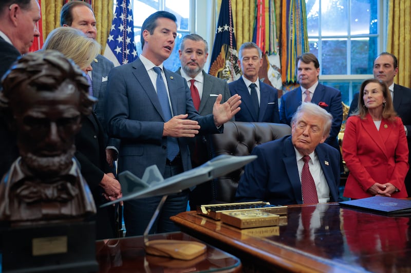 Sen. Bernie Moreno (R-OH) speaks as U.S. President Donald Trump hosts Republican members of Congress, automobile executives and administration officials to announce changes to the country's fuel economy standards in the Oval Office at the White House on December 03, 2025 in Washington, DC.