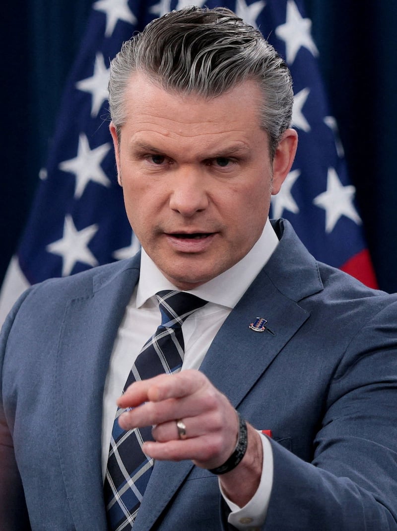 U.S. Secretary of Defense Pete Hegseth holds a briefing with Chairman of the Joint Chiefs of Staff General Dan Caine, amid the U.S.-Israeli war on Iran, at the Pentagon in Washington, D.C., U.S., March 19, 2026