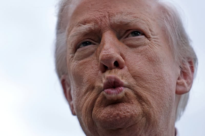 WASHINGTON, DC - MAY 08: U.S. President Donald Trump speaks to members of the media prior to a Marine One departure from the South Lawn of the White House on May 8, 2026 in Washington, DC. President Trump is flying to Sterling, Virginia to attend a LIV Golf dinner. (Photo by Alex Wong/Getty Images)
