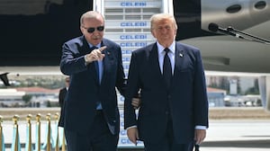 TOPSHOT - Turkish President Recep Tayyip Erdogan (L) welcomes US President Donald Trump (C) upon his arrival on Air Force One at Etimesgut Air Base near Ankara, on July 7, 2026, before attending the 36th NATO Heads of State and Government Summit. (Photo by SAUL LOEB / AFP via Getty Images)