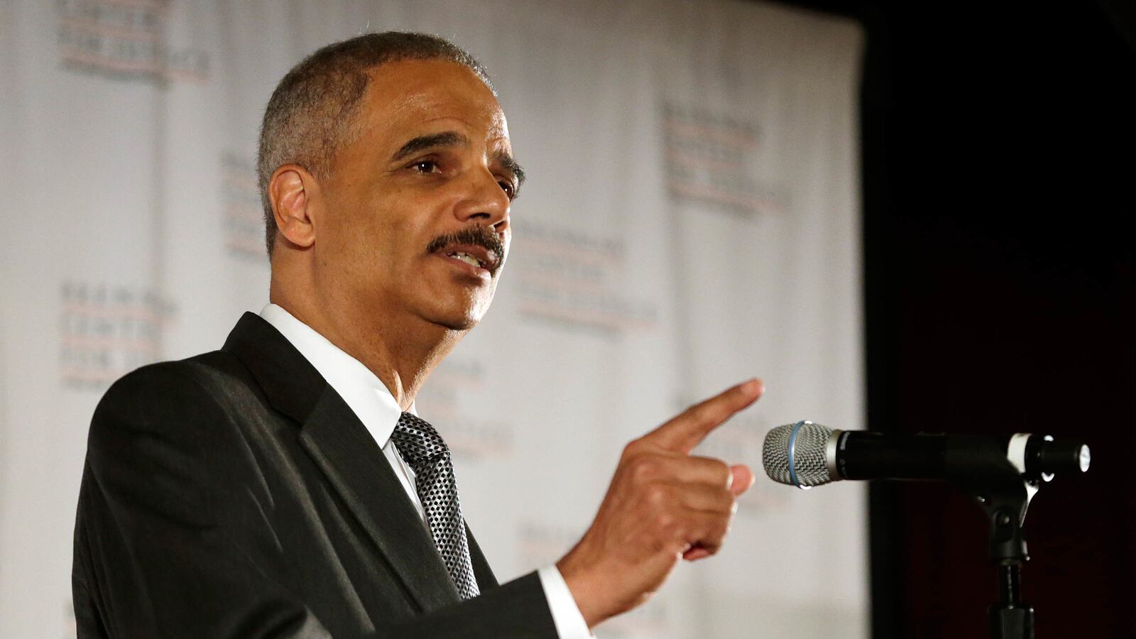 articles/2014/09/23/eric-holder-i-identify-with-ferguson-s-mistrust-of-cops/140923-dickson-holder-tease_bcbsp4