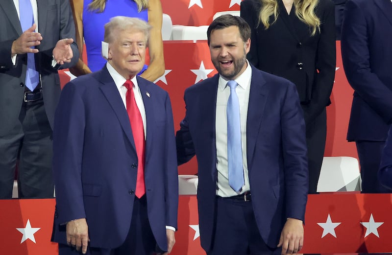 MILWAUKEE, WI JULY 15, 2024 -- Former US President Donald Trump, left, and J.D. Vance during the first day of the Republican National Convention at Milwaukee, WI on Monday, July 15, 2024. (Jason Armond / Los Angeles Times via Getty Images)
