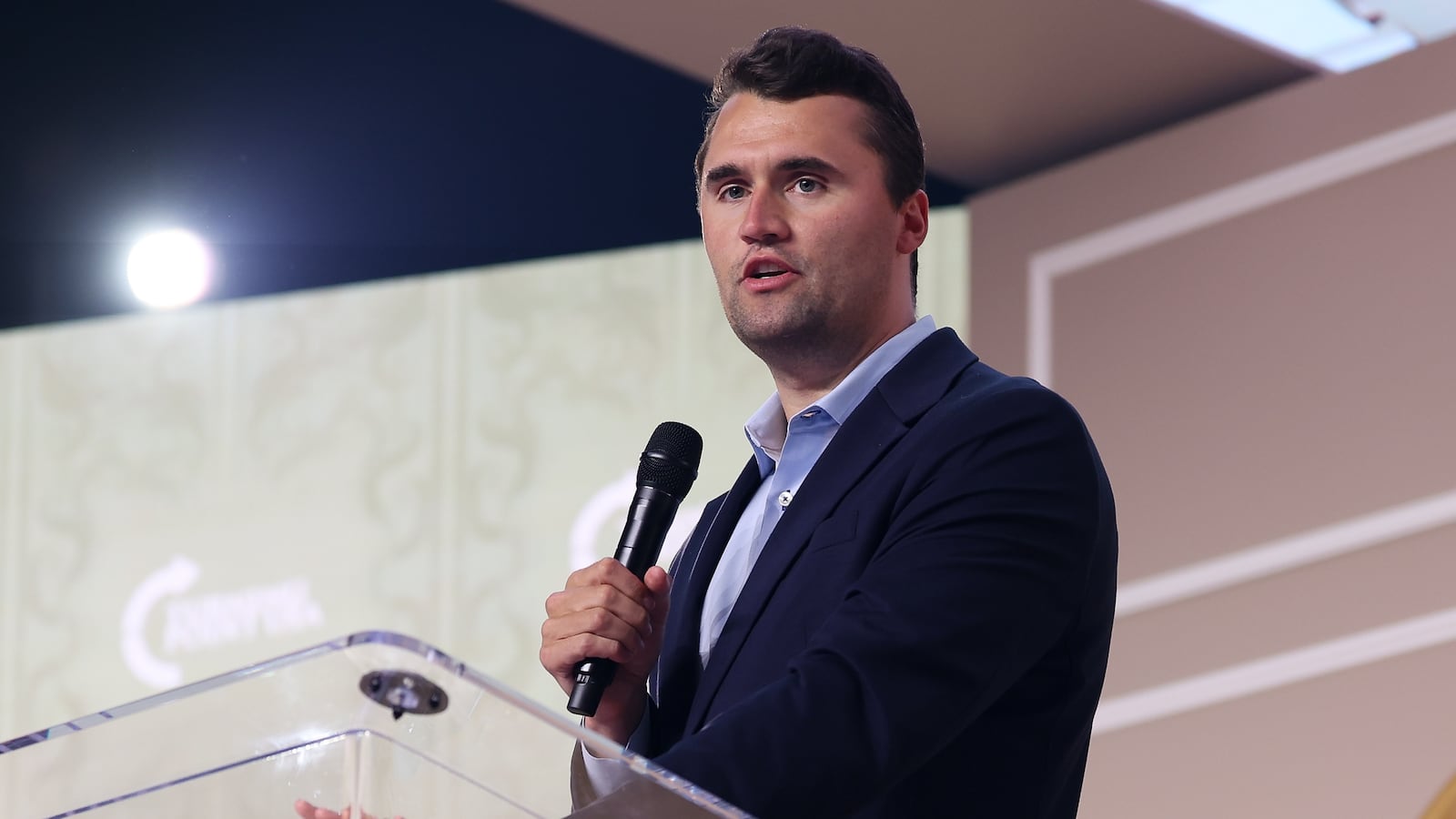 GRAPEVINE, TX - JUNE 14: Charlie Kirk speaks on-stage during the Turning Point USA Young Women's Leadership Summit at the Gaylord Texan Resort and Convention Center on June 14, 2025 in Grapevine, Texas.