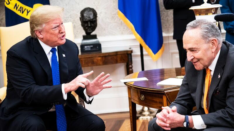 President Donald J. Trump debates with Senate Minority Leader Chuck Schumer, D-N.Y., during a meeting in the Oval Office of White House.