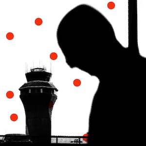 Silhouetted image of a man at Newark Airport with red dots all over
